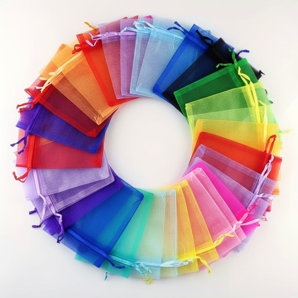 Assorted colorful organza bags arranged in a circular pattern on a white background.
