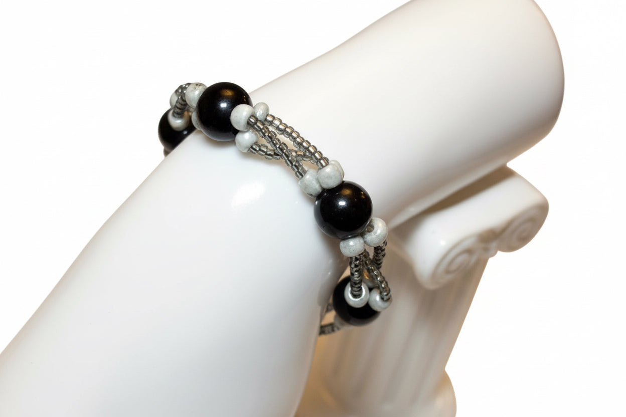 Handmade elasticated double strand bracelet in black glass pearl by Majestic Gems by Sarah