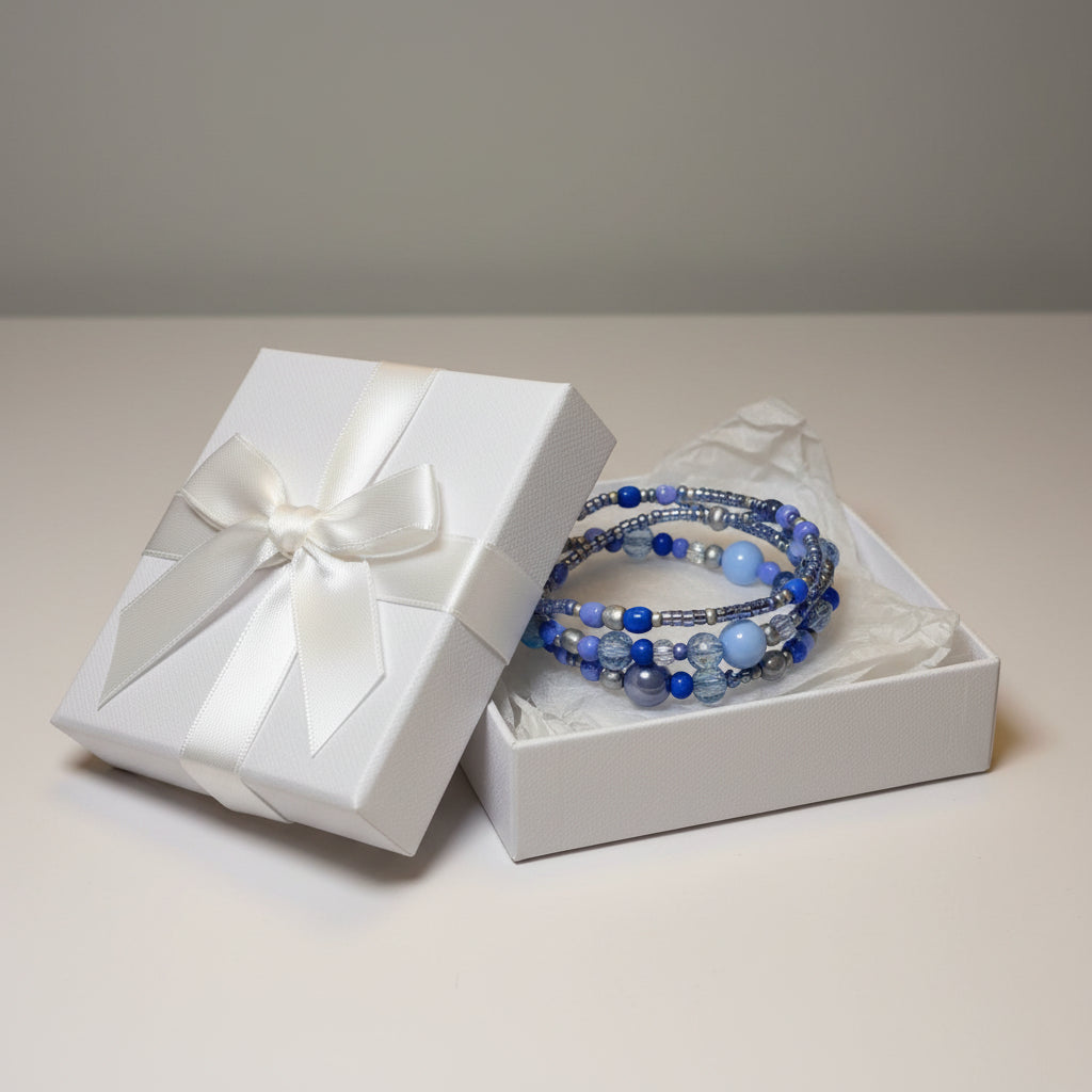 Blue beaded triple bracelet set in a white gift box