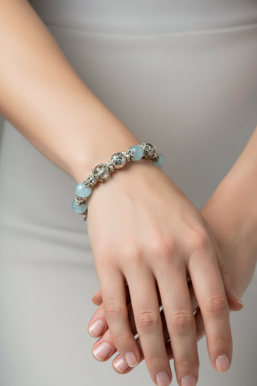 Bracelet with blue glass pearls on a model