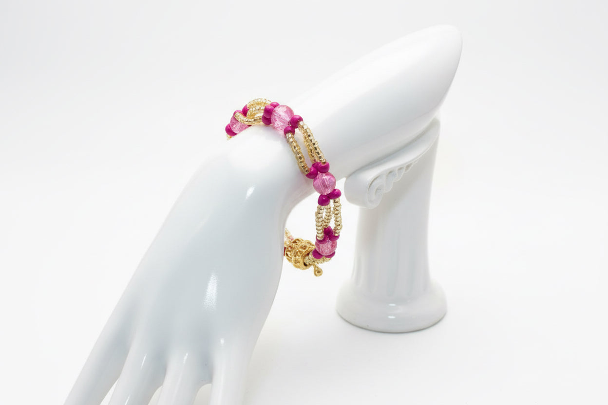 Handmade elasticated double strand bracelet in bright pink/yellow acrylic bead by Majestic Gems by Sarah