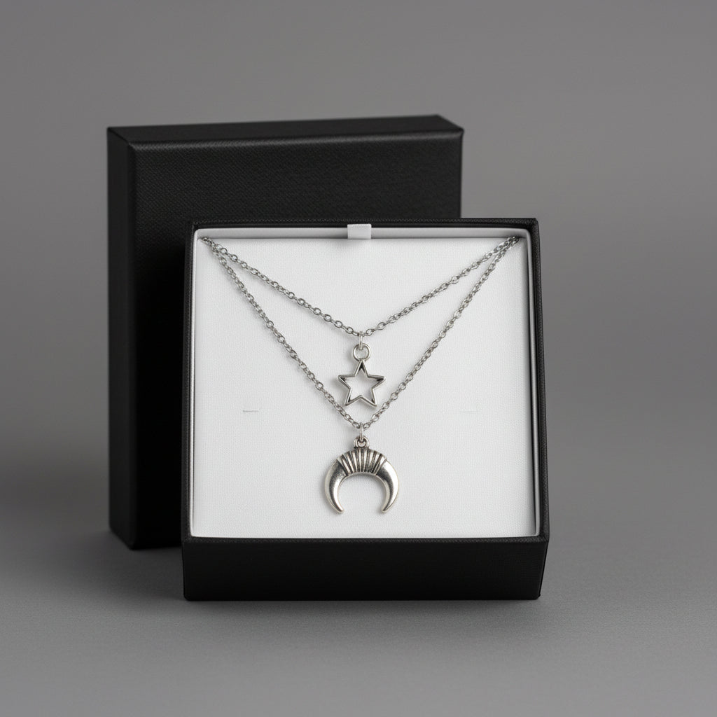 Necklace with star and crescent moon pendants in a black gift box