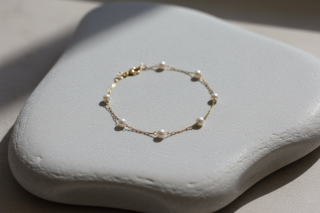 Pearl bracelet on a white surface