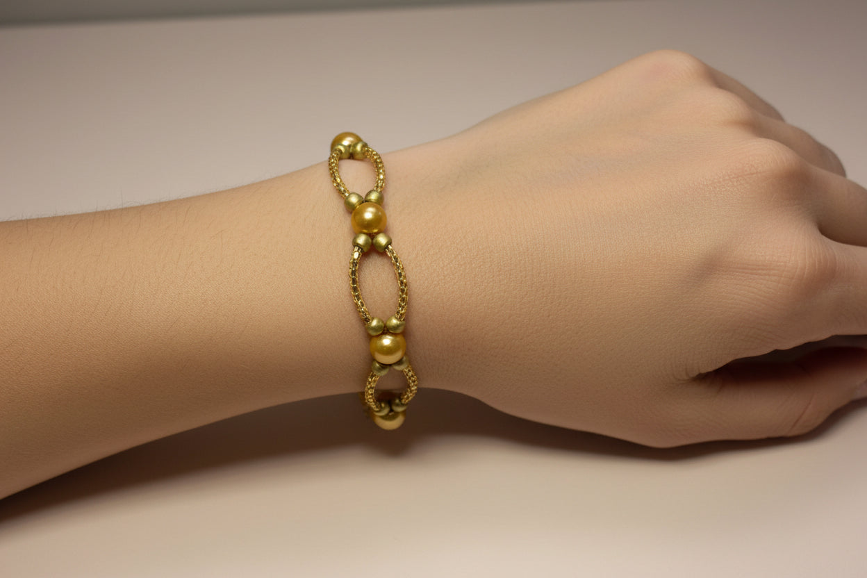 Handmade elasticated double strand bracelet in gold glass pearl by Majestic Gems by Sarah