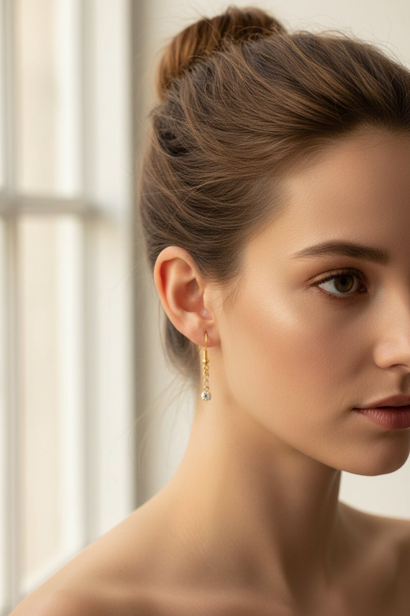 Women wearing diamante dangle earrings