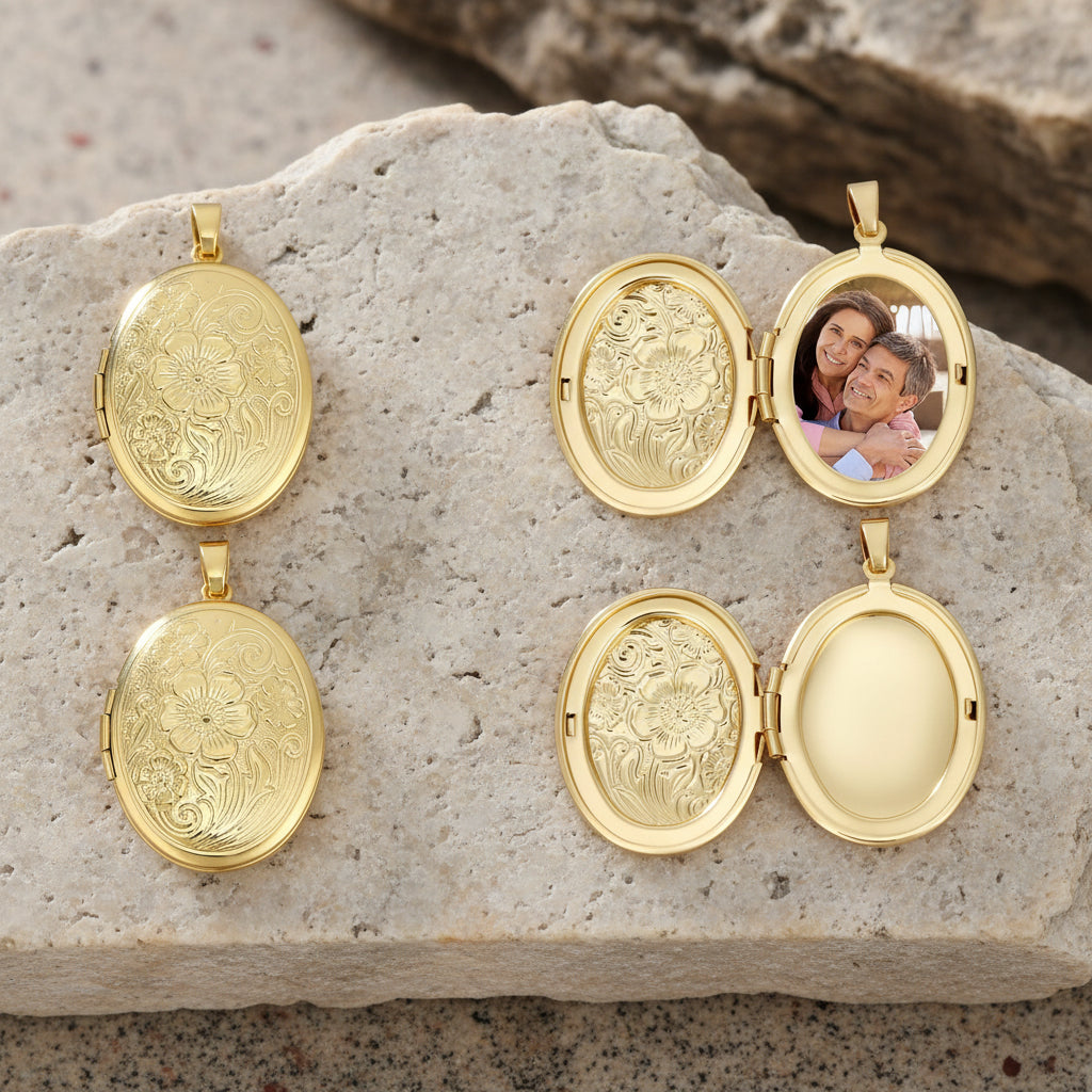 Gold oval lockets open and closed with decorative designs on a large stone