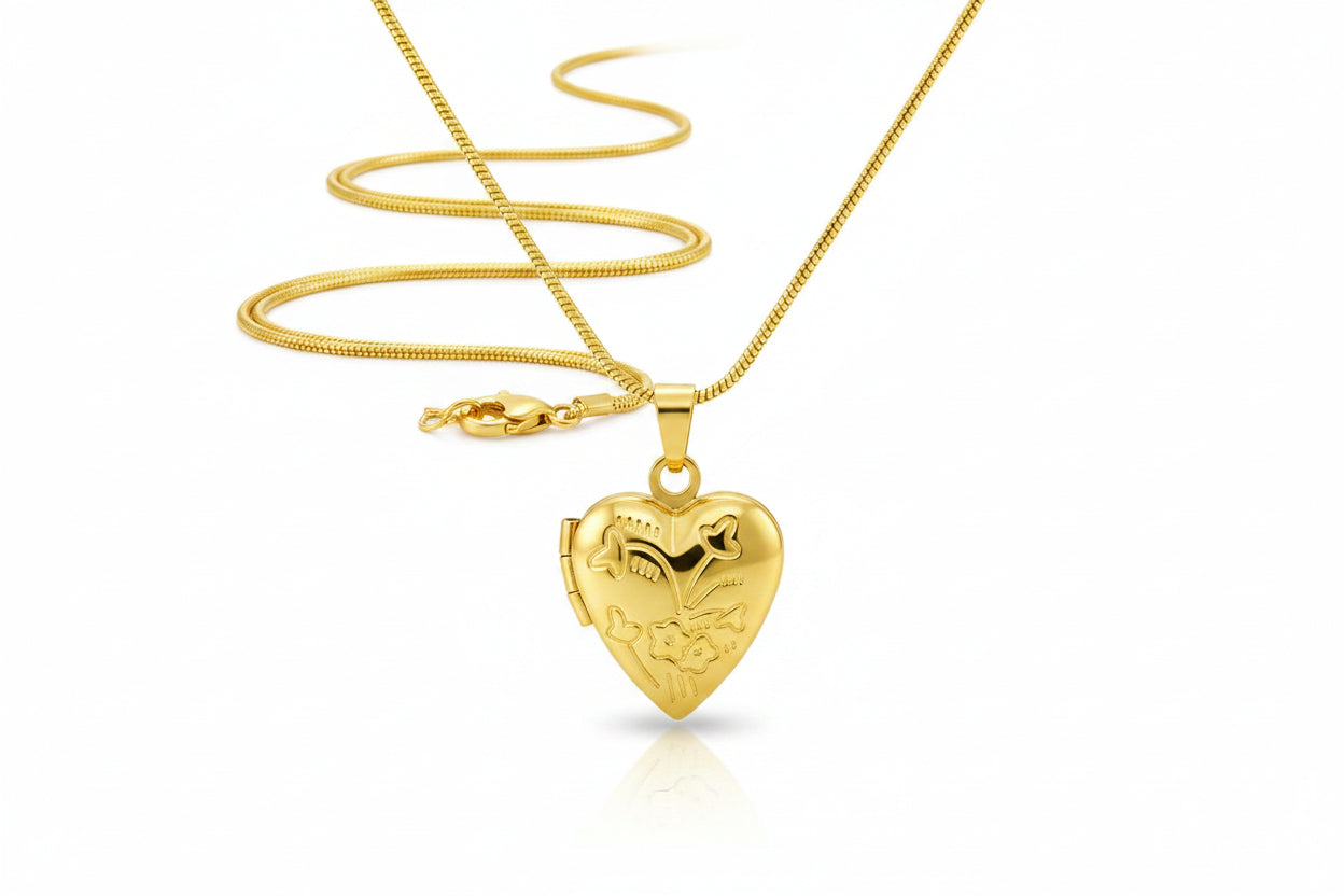 Gold heart-shaped locket on a snake chain necklace