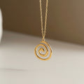 Gold stainless steel spiral pendant necklace hanging