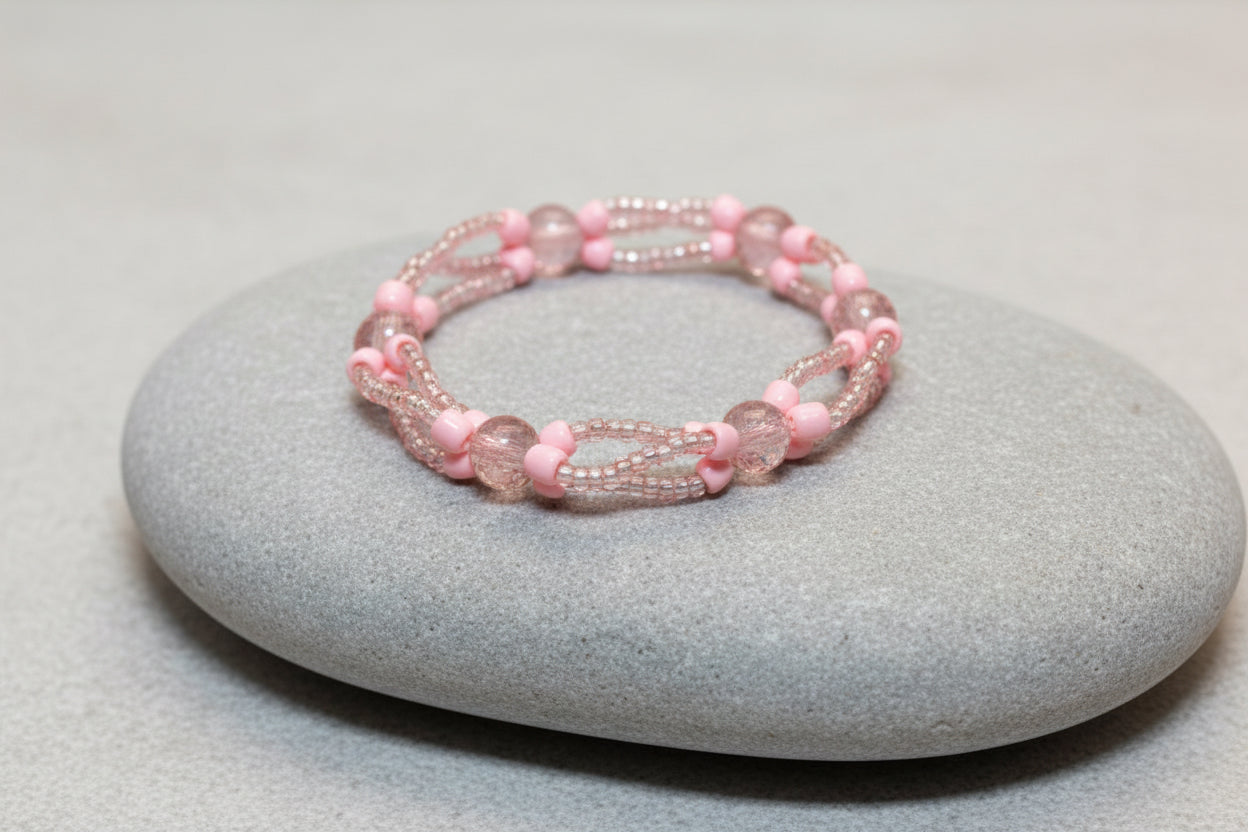 Handmade elasticated double strand bracelet in light pink acrylic pearl by Majestic Gems by Sarah