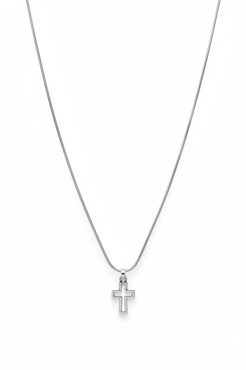 Silver cross pendant necklace on a white background