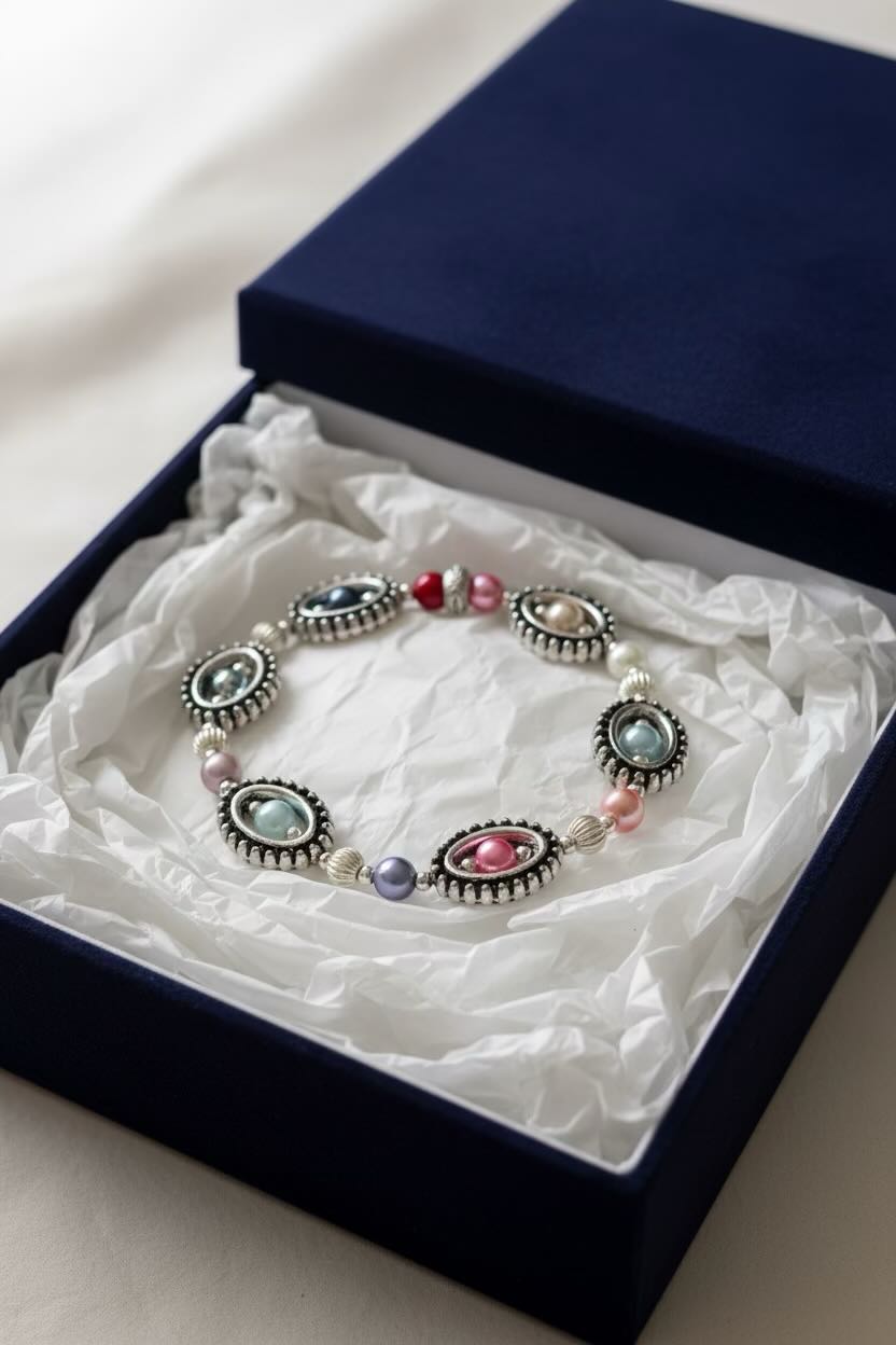 Bracelet with colorful beads in a blue jewelry box