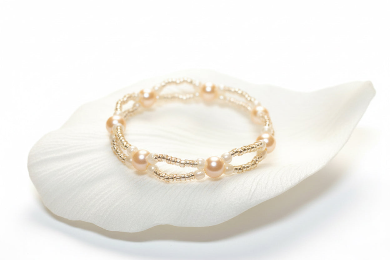 Handmade elasticated double strand bracelet in peach acrylic pearl by Majestic Gems by Sarah