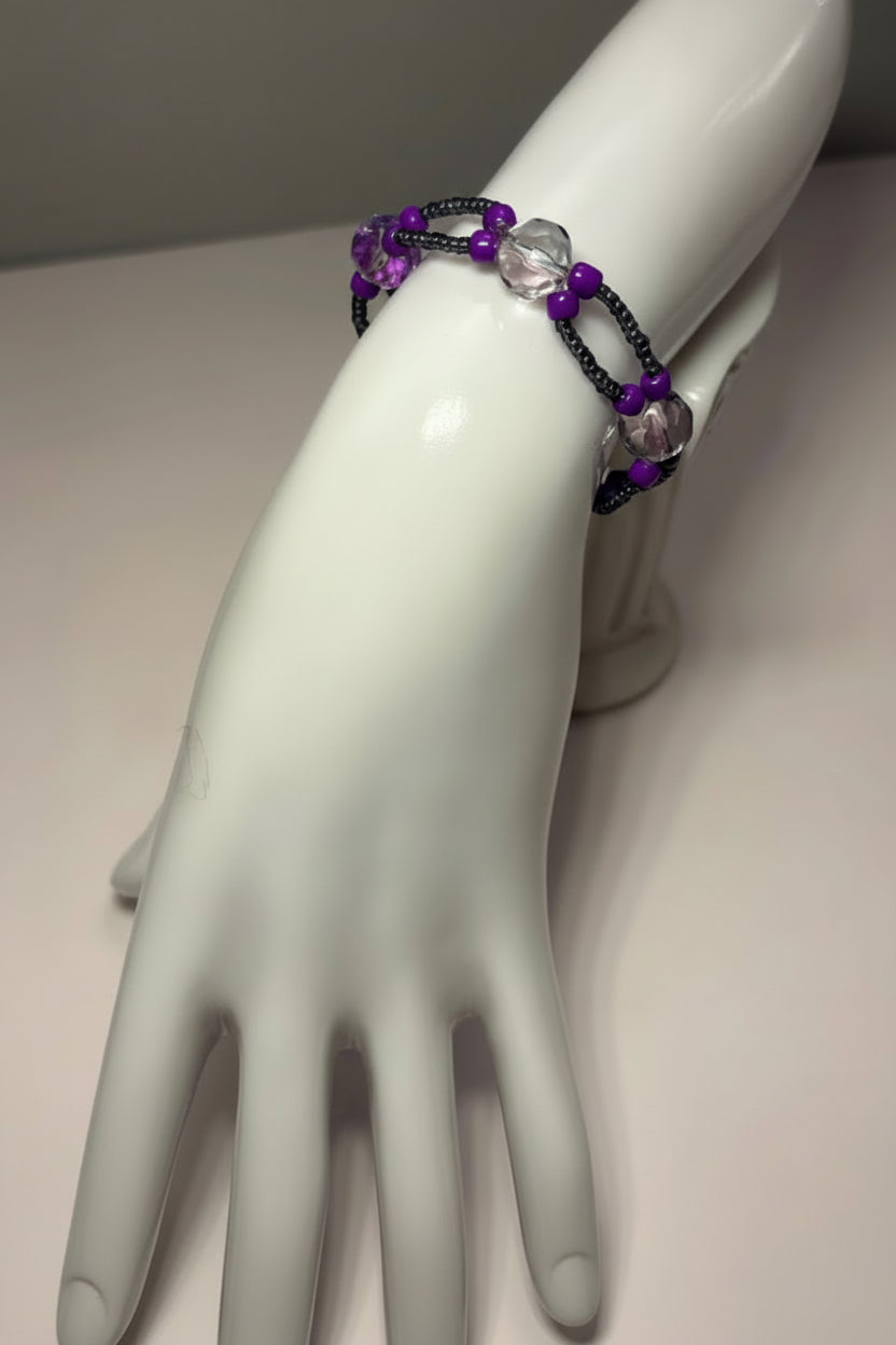 Handmade elasticated double strand bracelet in purple glass bead by Majestic Gems by Sarah