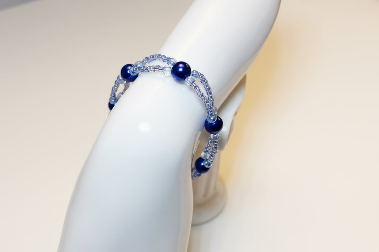 Handmade elasticated double strand bracelet in royal blue glass pearl by Majestic Gems by Sarah