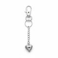A silver-toned metal keychain featuring a lobster clasp, a split ring, a short chain, and an ornate heart-shaped locket pendant, shown on a plain white background.