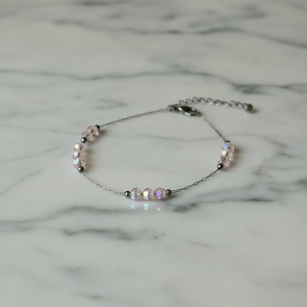 Beaded bracelet on a flat white/grey marbled surface