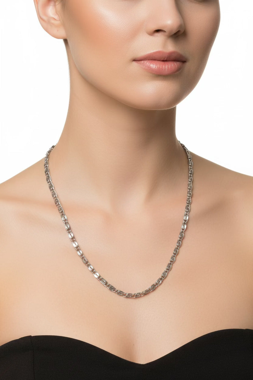 Necklace on a model against a white background