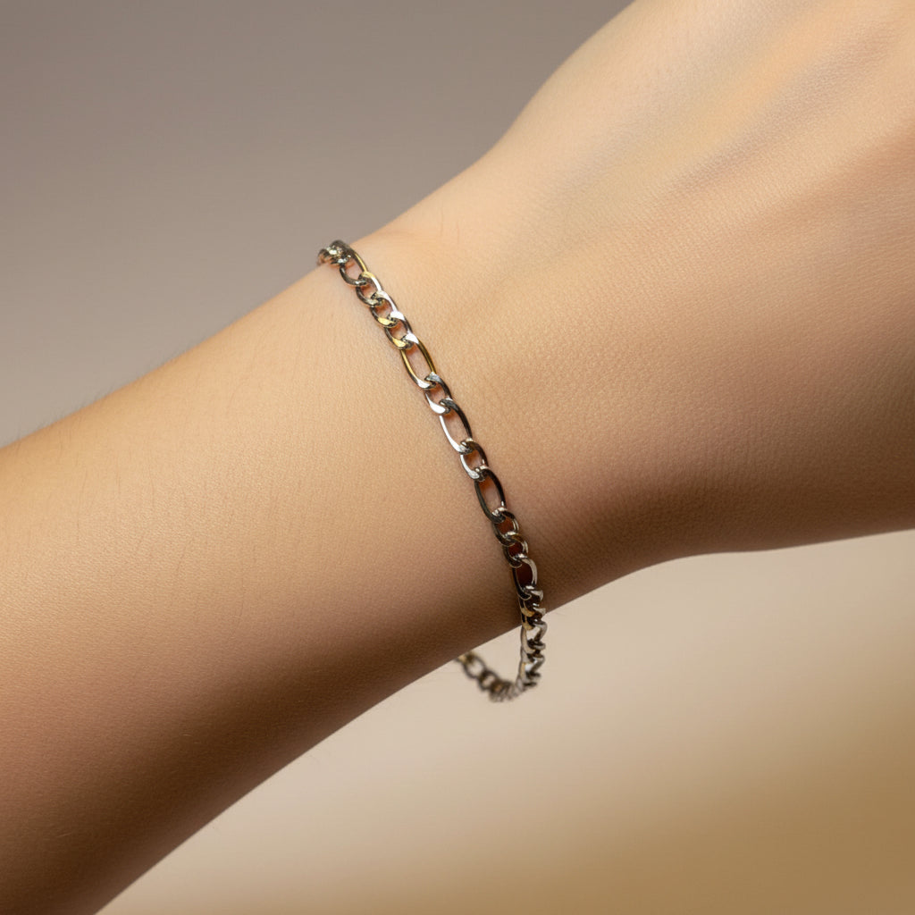 Gold chain bracelet on a model 