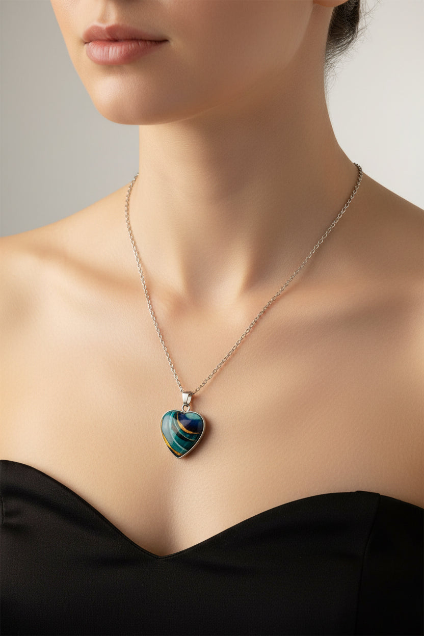 Necklace with a heart-shaped pendant on a model
