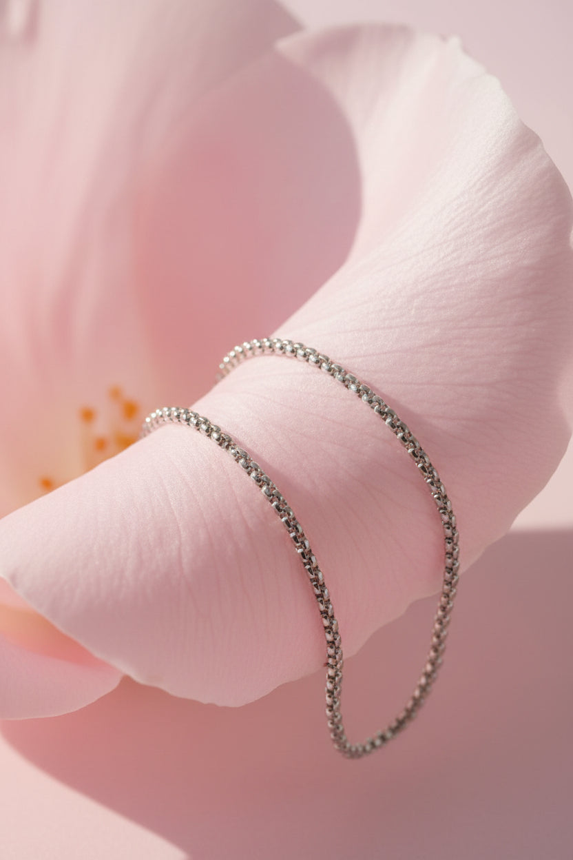 Bracelet on a large pink petal
