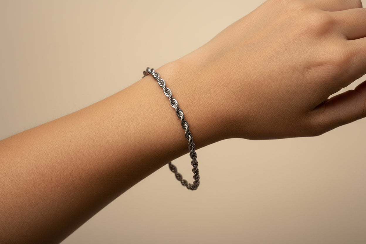 Sliver bracelet on a model's hand