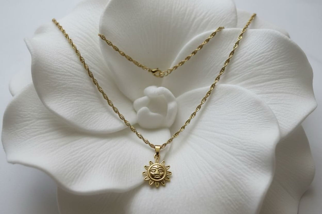 Stainless Steel Necklace with Gold Sun Face Pendant