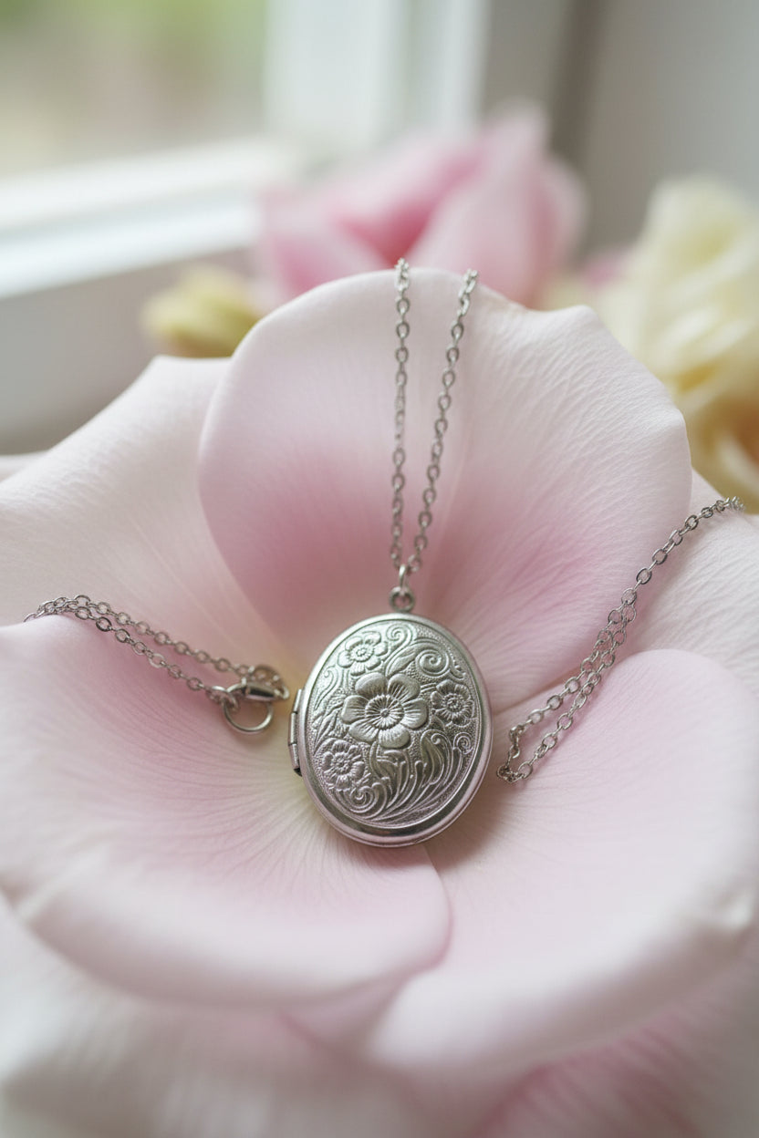 Silver sterling necklace & oval flowered design stainless steel locket on a large petal