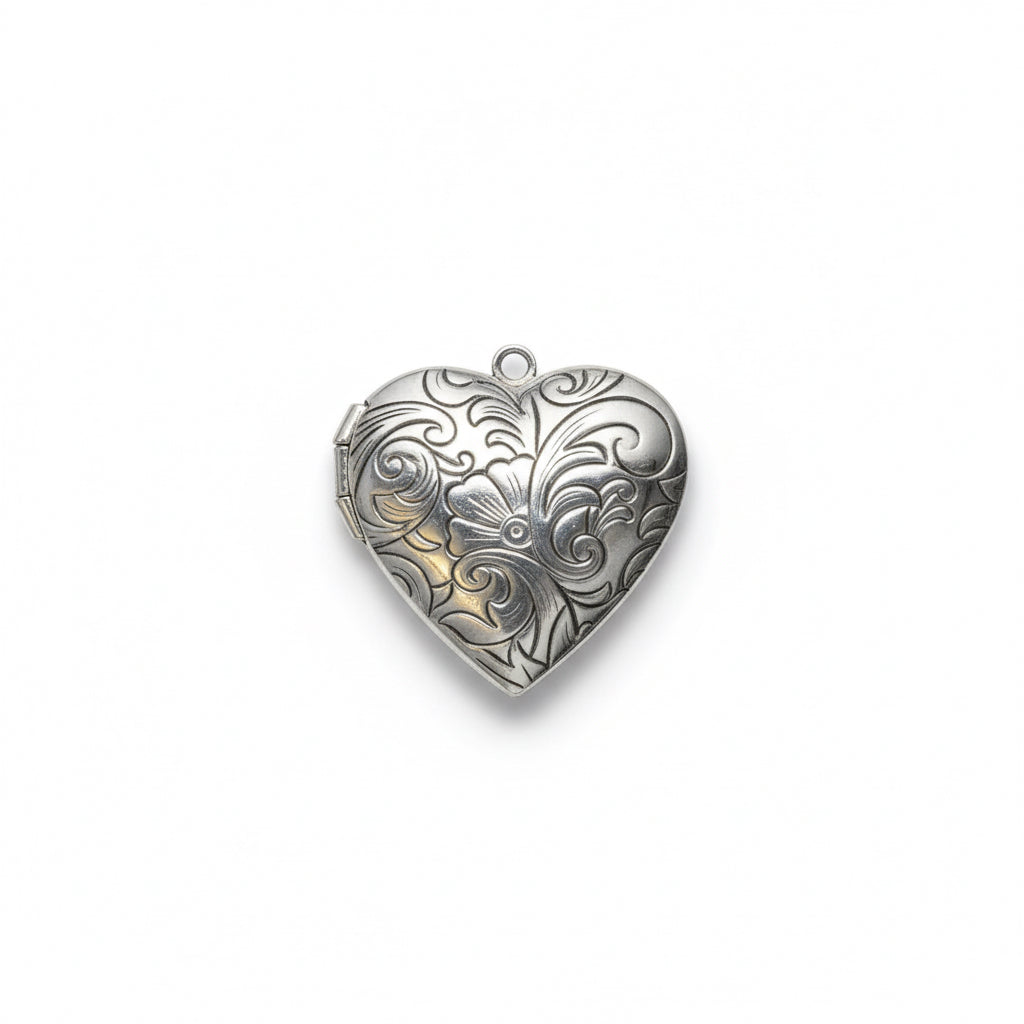 Heart-shaped silver pendants on white background