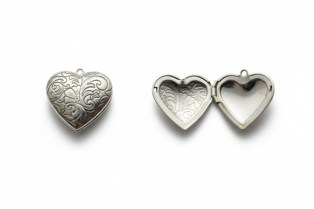Heart-shaped silver locket on a light gray background