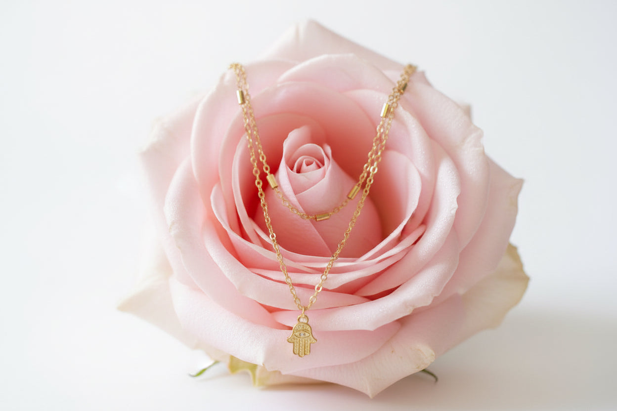 Gold chain necklace with a pendant on large rose  