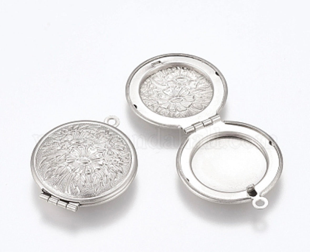 Round flowered locket on white background