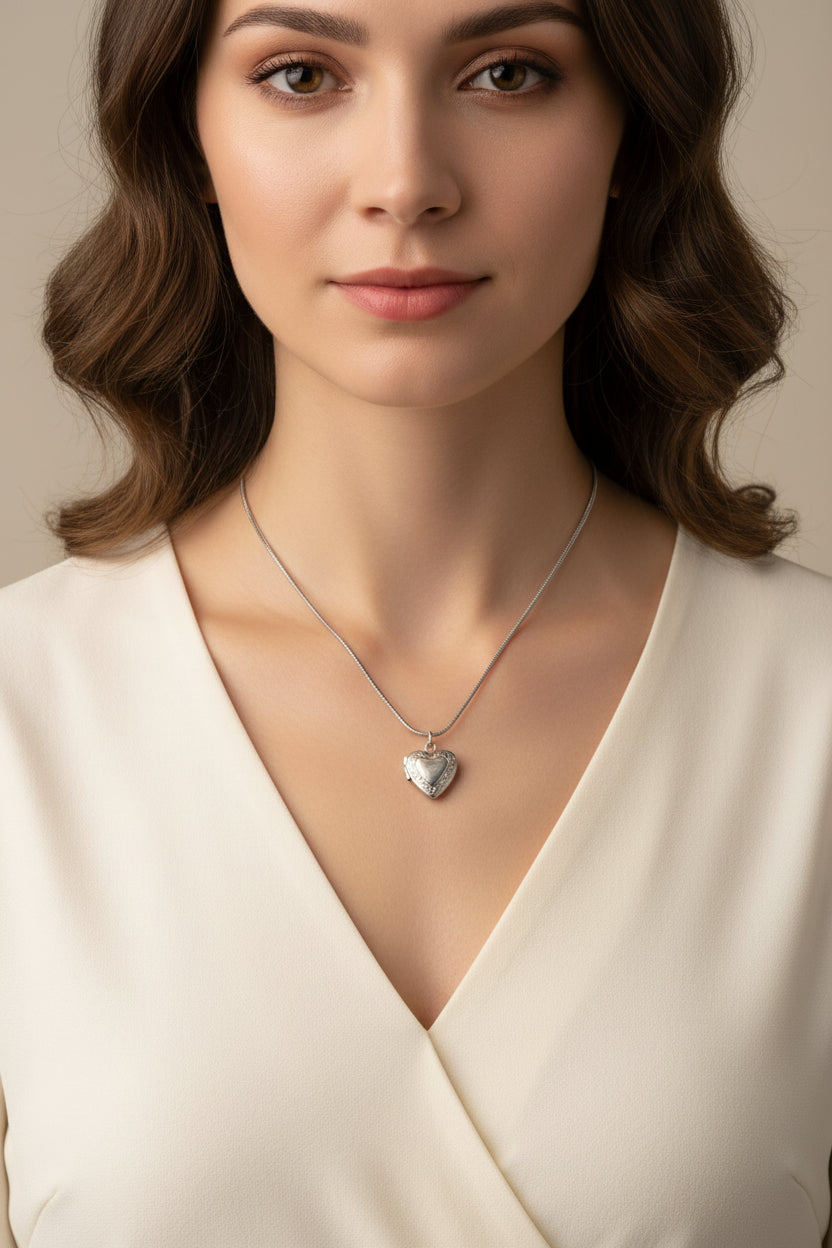 Stainless steel heart-shaped locket necklace on a model
