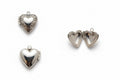 Heart-shaped silver locket on a white background