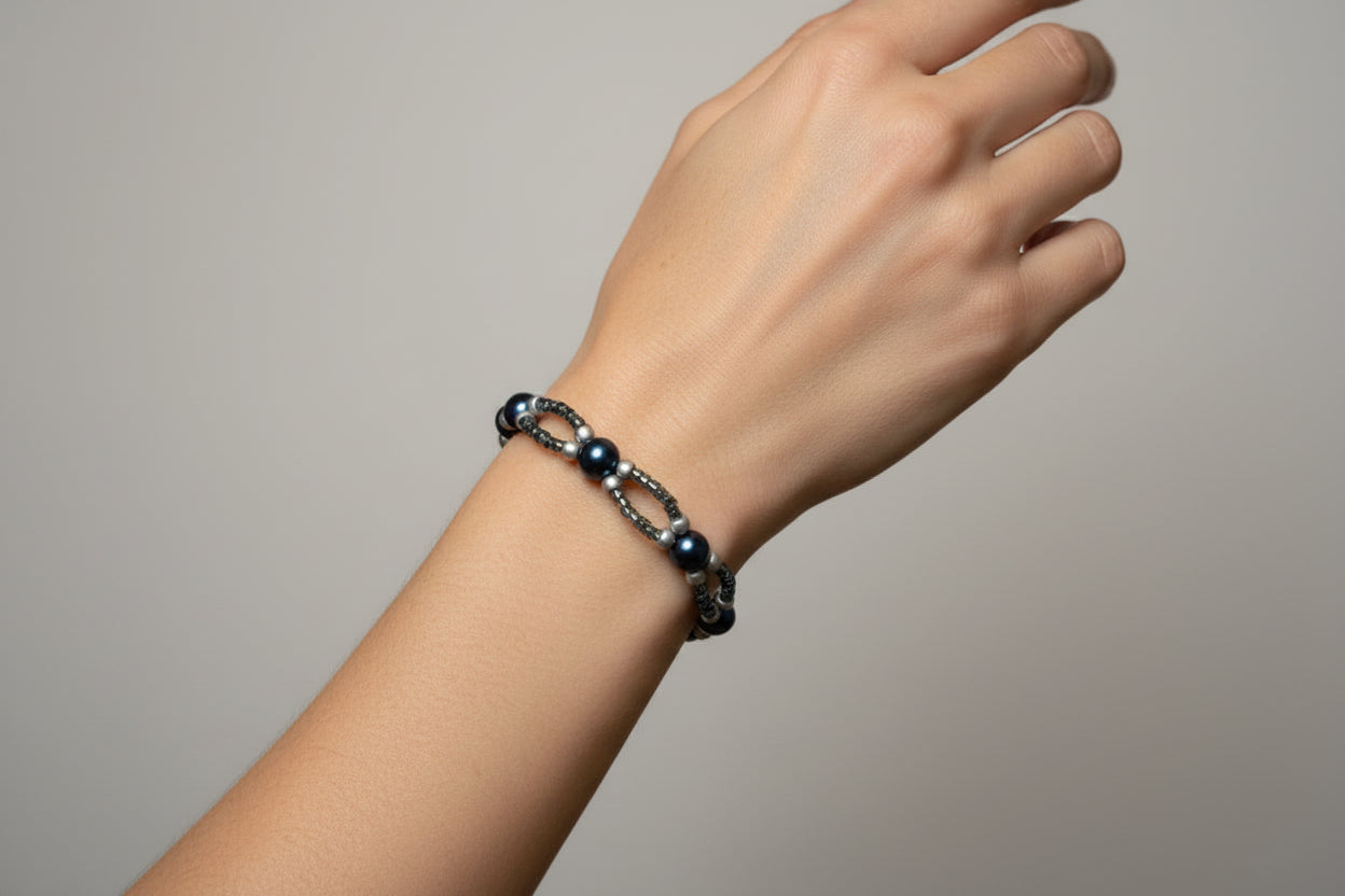 Handmade elasticated double strand bracelet in steel blue glass pearl by Majestic Gems by Sarah