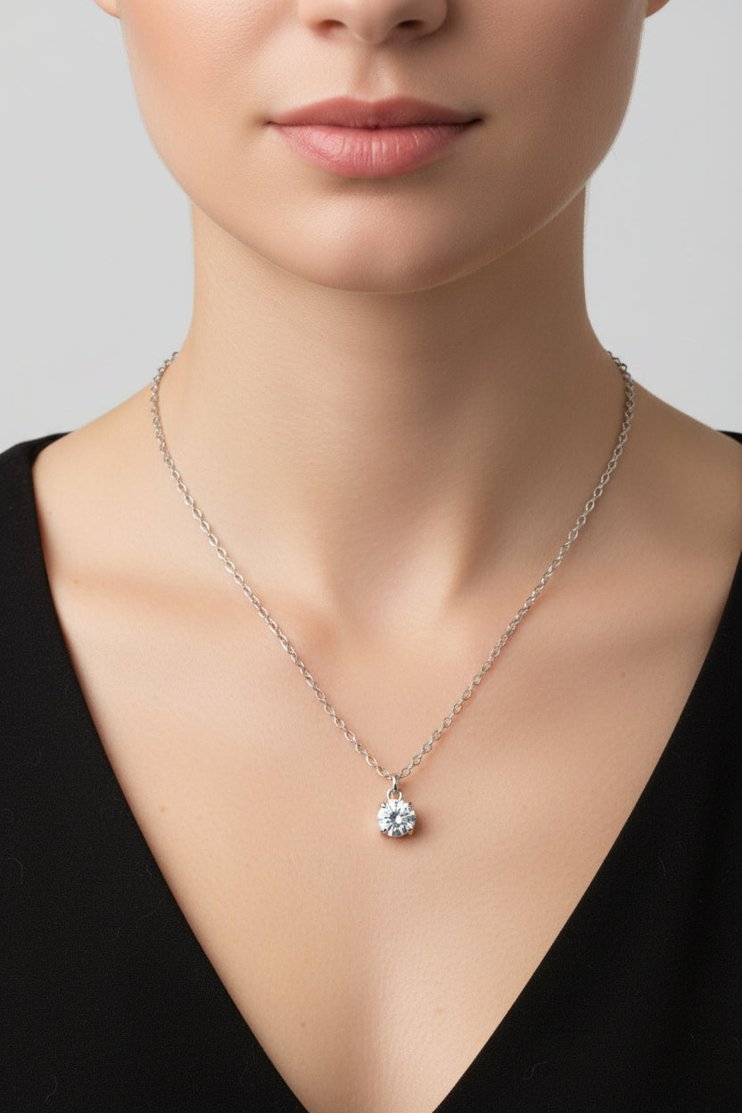 Necklace with a diamond pendant on a model