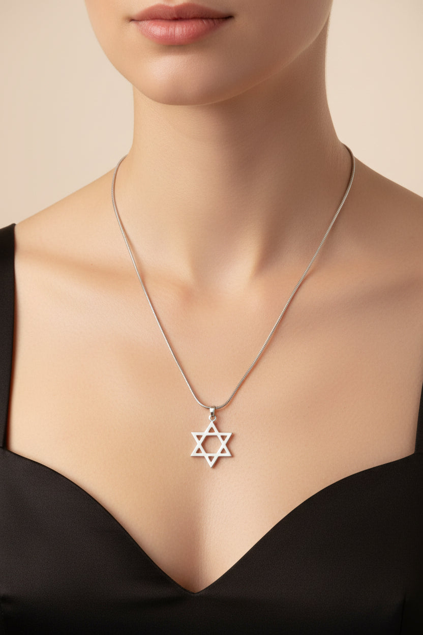 Silver necklace with a Star of David pendant on a model
