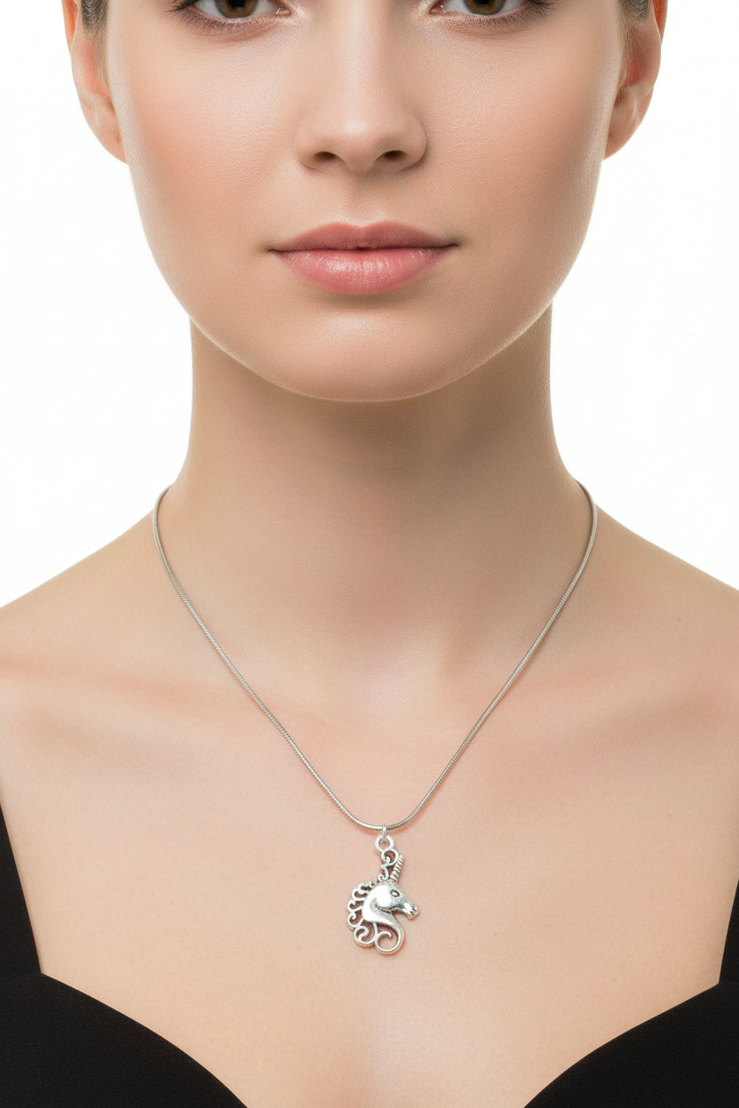 Silver necklace with a horse pendant on a model