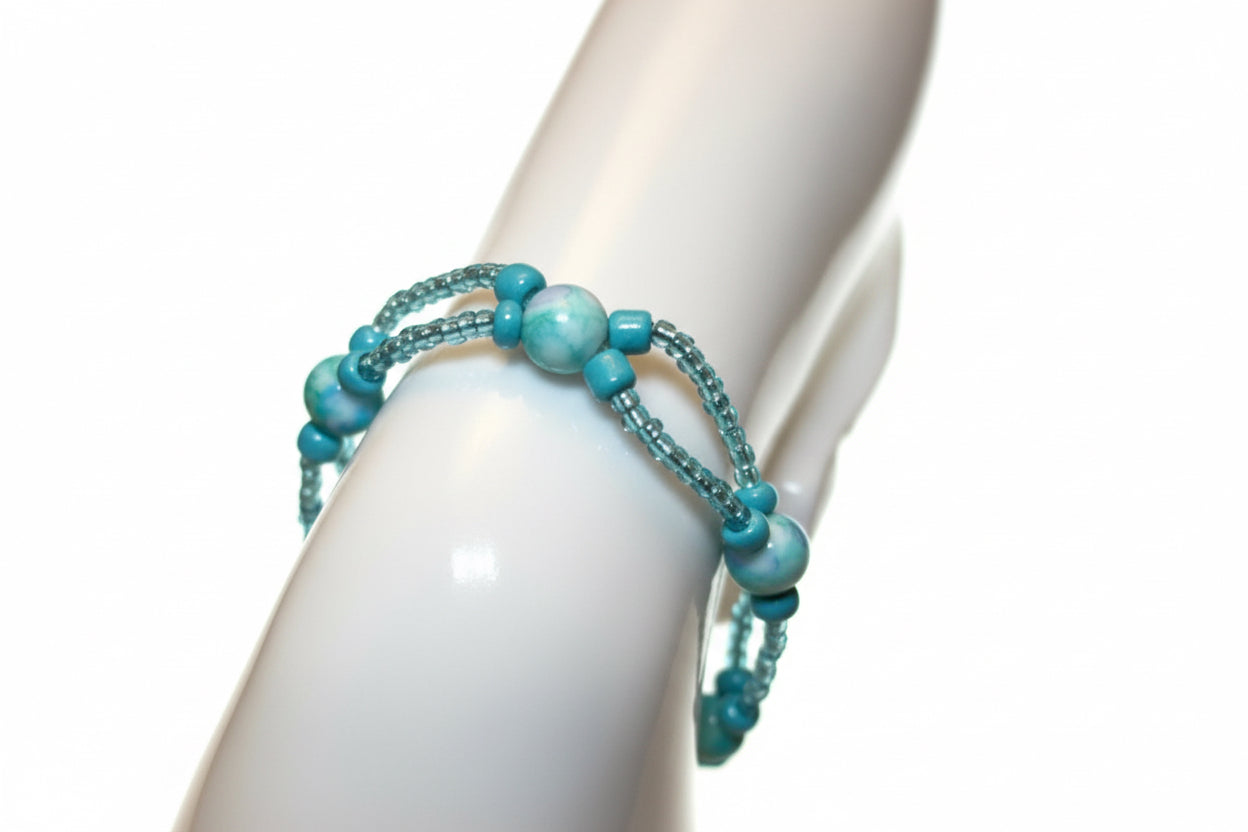 Handmade elasticated double strand bracelet in turquoise acrylic bead [ by Majestic Gems by Sarah
