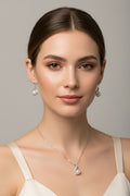 Jewelry set with necklace and earrings on a model