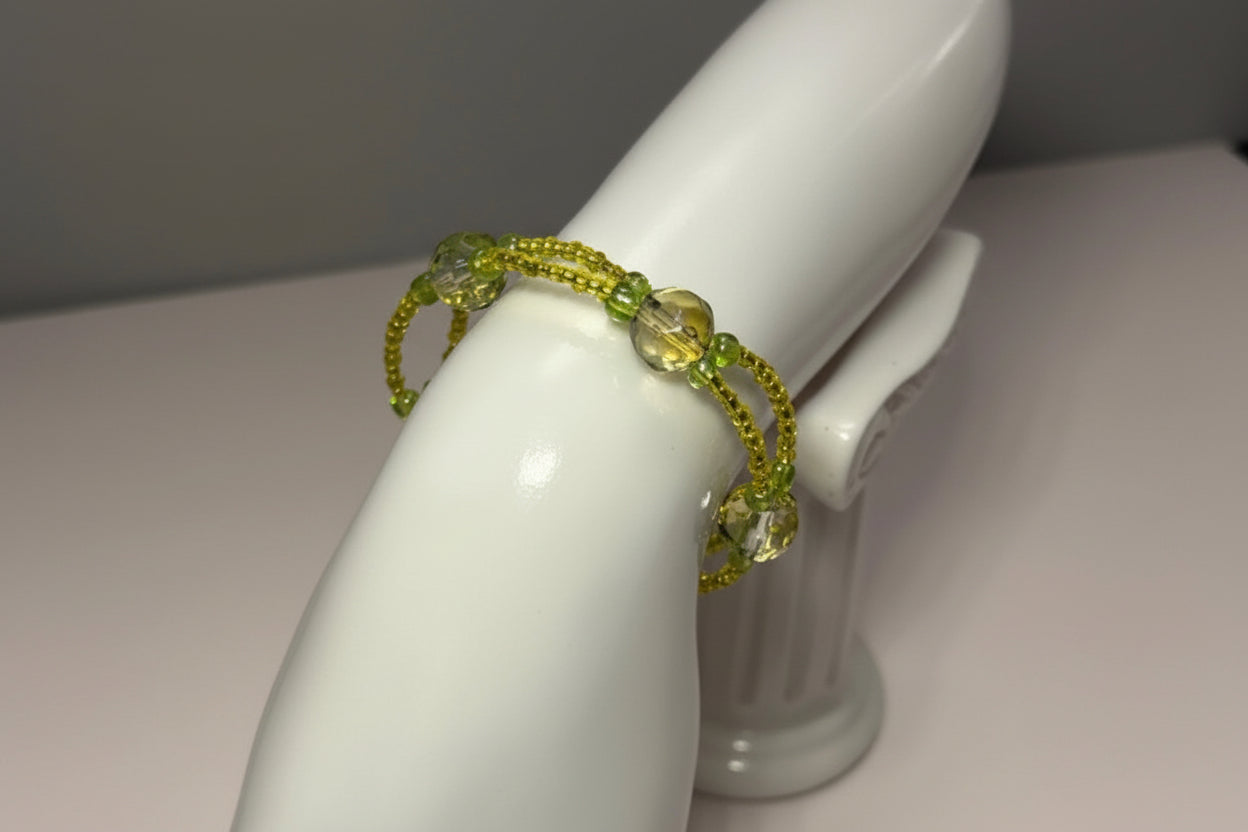 Handmade elasticated double strand bracelet in yellow/lime glass bead by Majestic Gems by Sarah