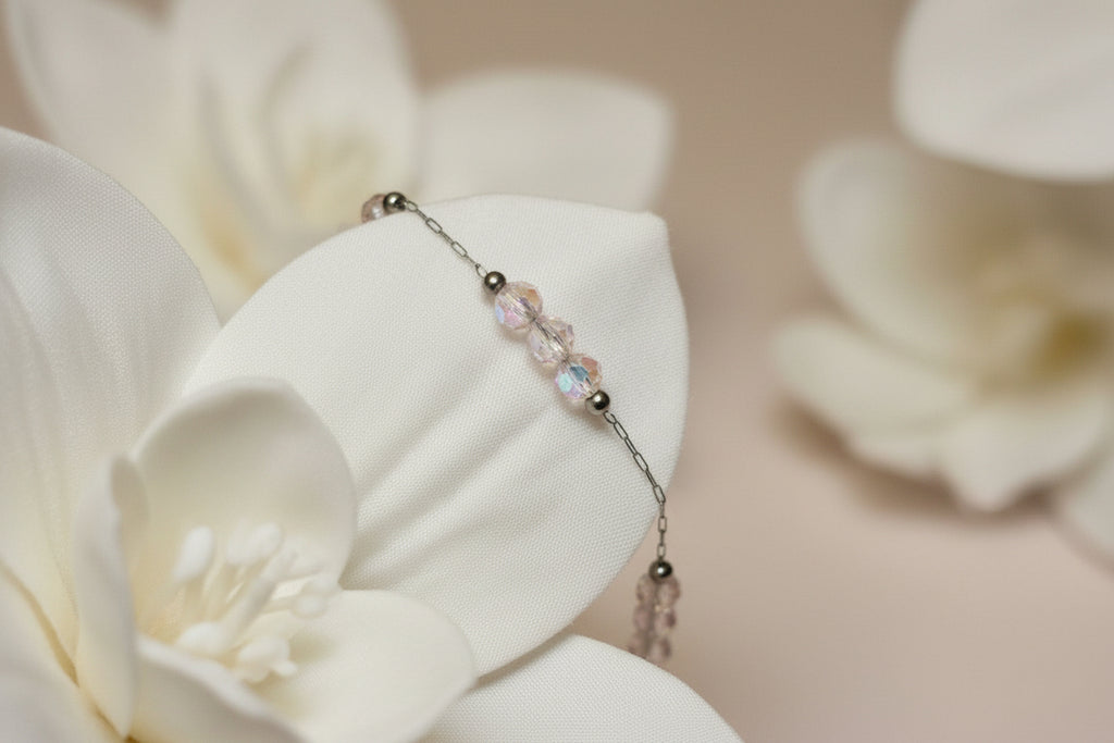 Beaded bracelet on a large white petal